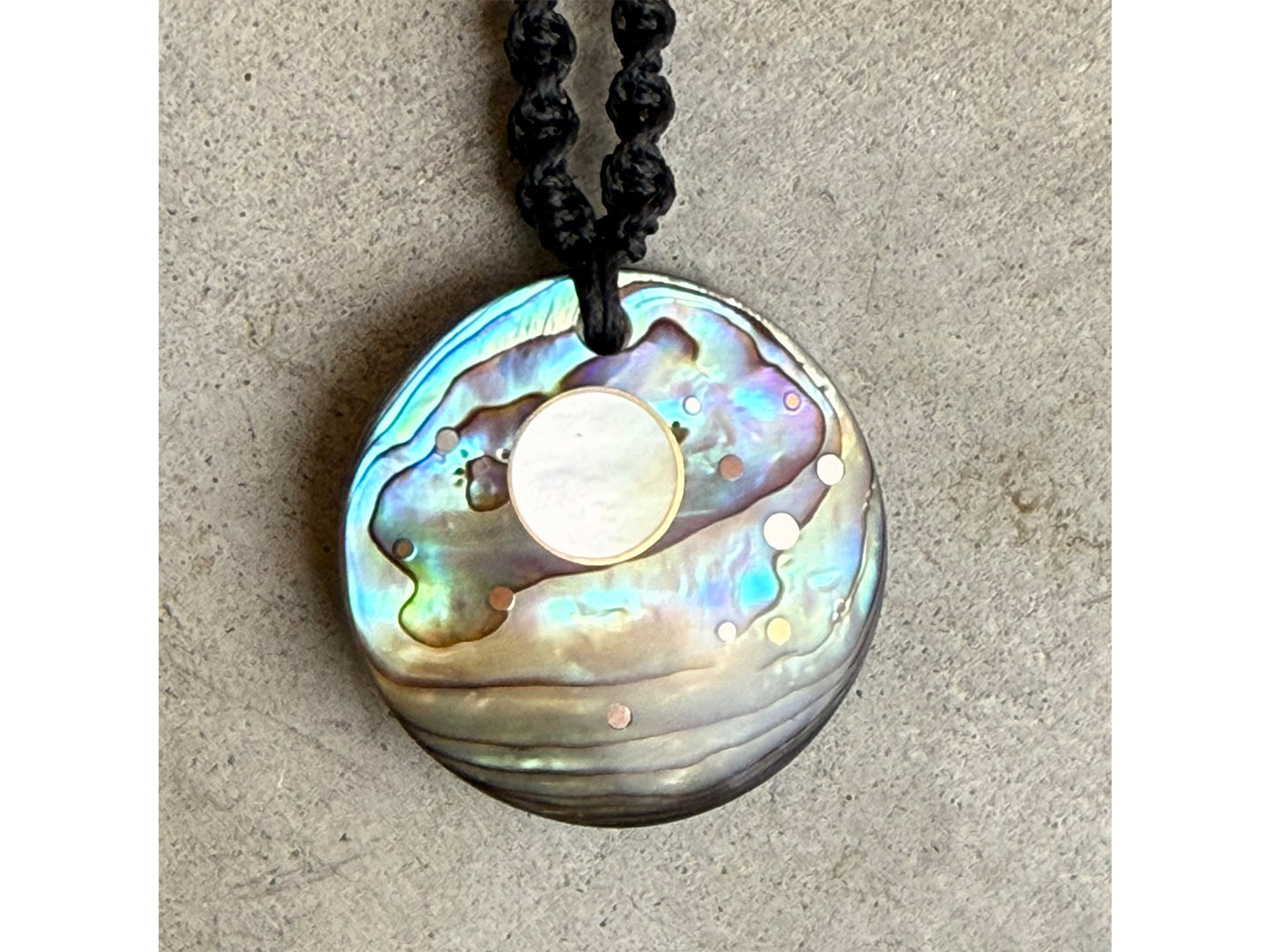 Reversible Ebony southern cross , Paua shell matariki disc