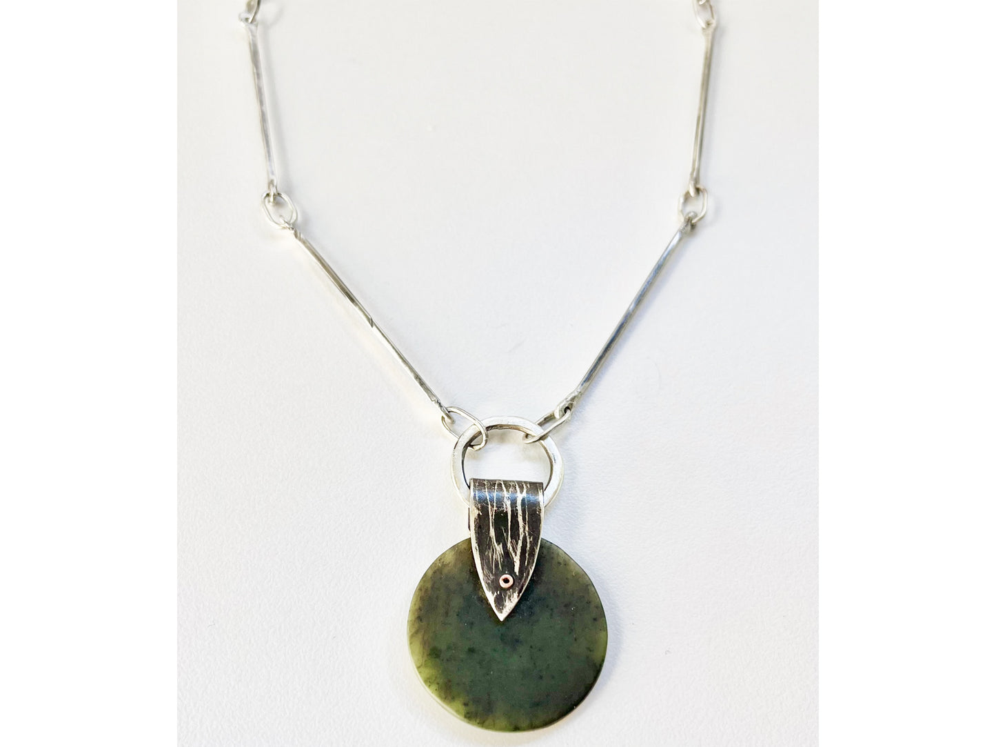 Silver chain with round jade pendant