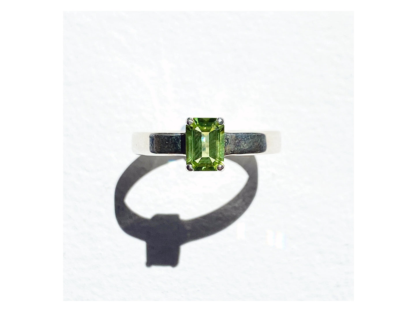Emerald Cut Claw Set Peridot Ring