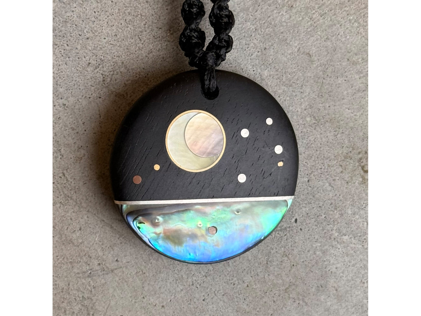 Reversible Ebony southern cross , Paua shell matariki disc