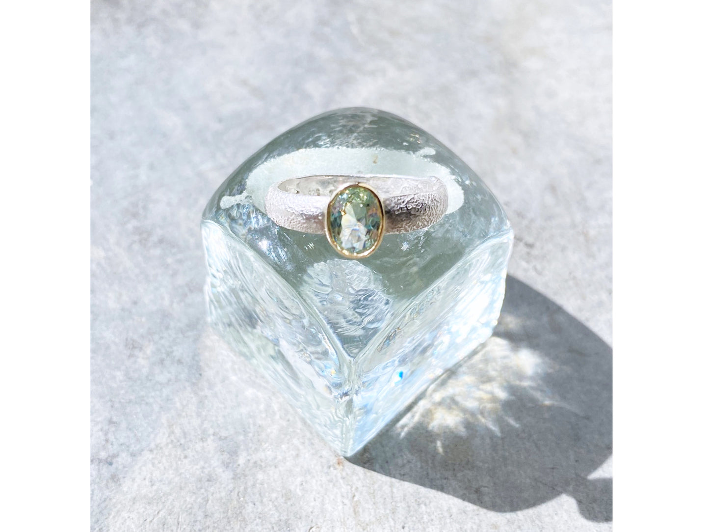 Reticulated silver band green amethyst ring