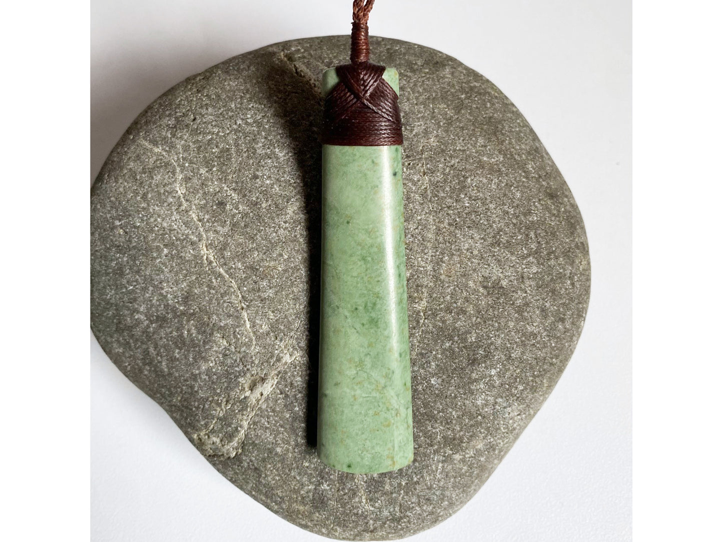 Hei Toki Kawakawa Pounamu Pendant brown cord
