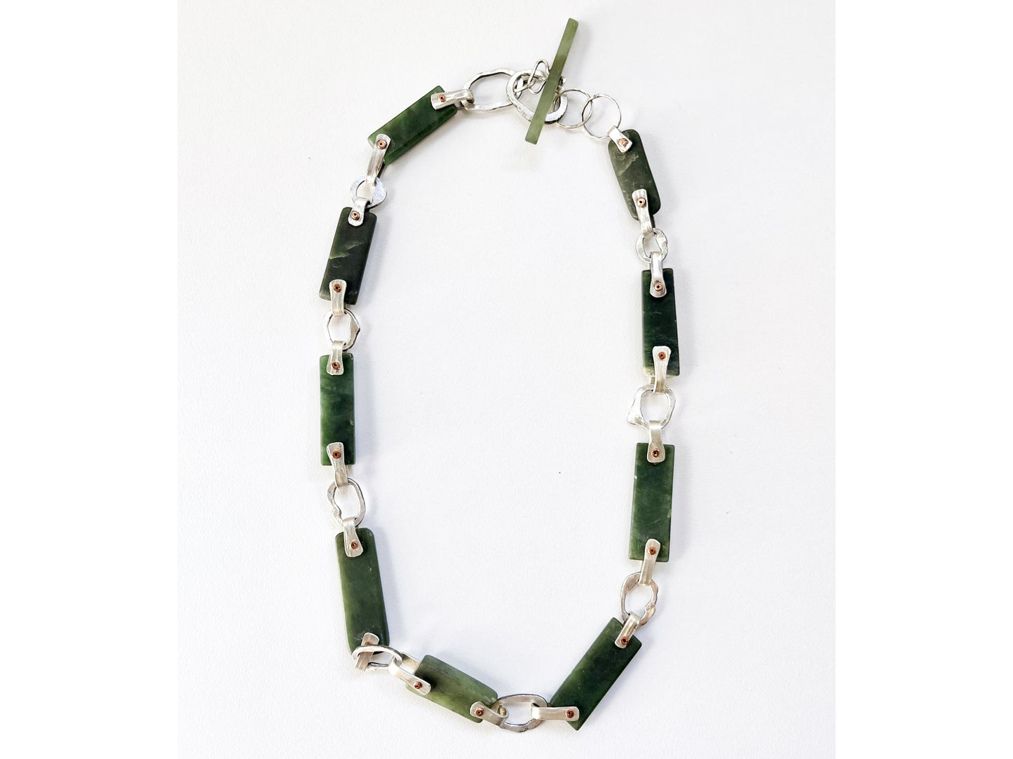 Silver necklace with jade bars and copper rivets