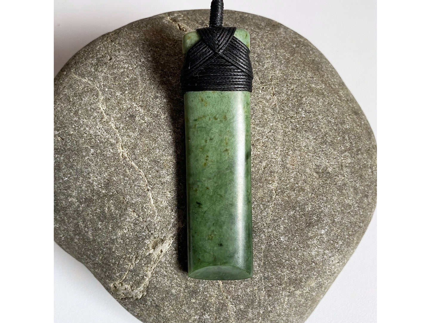 Hei Toki Kawakawa Pounamu Pendant (black cord)