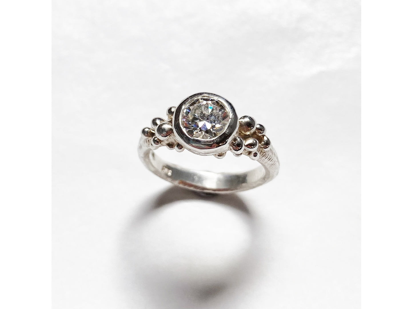 Silver and Moissanite Ring